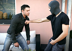 The thief is having his way with the man of the house