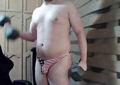 Muscled himbo demonstrates off his patriotism on web cam