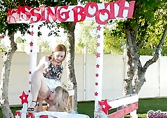 Ivy Wolfe has been running a giving a kiss booth for charity all day and is in the middle of giving a kiss a line up of angels one by one As all the b