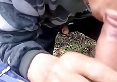 Older Asian Grandpa sucks younger in forest