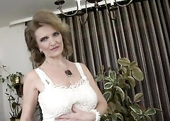 Posh grandma with large saggy boobs