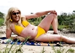 Mrs Samantha going out to the dunes near Langevelder Slag, for a leisurely walk and to discover a fine spot for some sexy sunbathing, to enhance the w