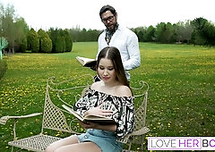 Dean Van Damme enjoys a passionate titjob from a brunette with huge tits in a sunlit modern lounge