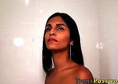 Horny Latina transsexual gives a steamy blowjob at the gloryhole