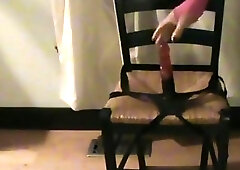 Chubby shemale in sexy stockings rides a big dildo passionately