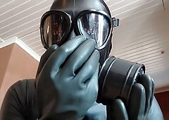 Black gay rubber master explores kink and dominance