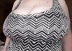 Large charming bazookas swing close-up.