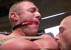 Male slave with big muscle gets roughly fucked and caged