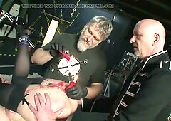 German dominator Ingo controls his bound bdsm submissives in a harsh dungeon session