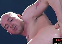 Inked submissive jock enjoys deep fisting