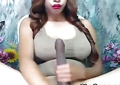 Shemale teases with her big cock before a rough masturbation