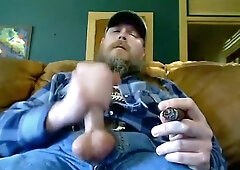 Bearded Biker Smoking and Jacking