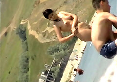 Dude peeks on a gal who undresses before swimming