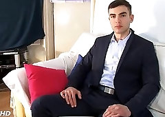 in suit handsome banker gets wanked his big cock by guys in spite of him