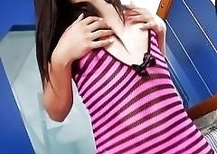 A very sexy tgirl jerks off as we watch her