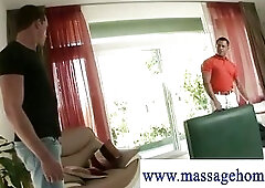Masseur makes preparations stretching muscles