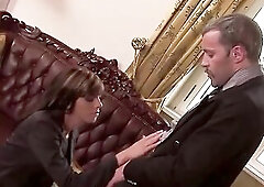 A secretary, adorned in agreeable underware, engages in ass-plug in a doggie style position with partners of varying ages.