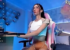 skinny tattooed tgirl in glasses jerks off her big hung cock on cam