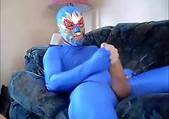 dude in mask a blue zentia suit strokes his big cock 6