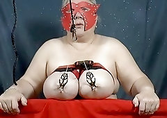 Granny's tits are tied up and her nipples are tortured