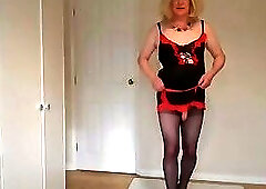 Red and black maid's outfit with black pantyhose and high heels