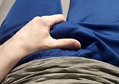 A stud in blue sweatpants caresses his swelling
