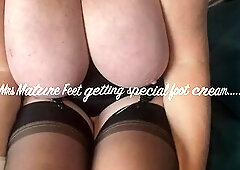 Mrs Mature Feet getting a special load of cream on her fully fashioned nylon feet, her friend really enjoys playing with her nylon toes before being a