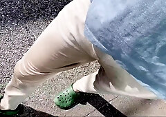 Urinating in trousers while ambling