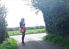 Crossdressing She-Creature Outdoors Peeing and Posing