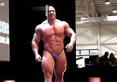 Egyptian God, Atiea Shalan! The muscle god in hot blue tiny posing trunks!