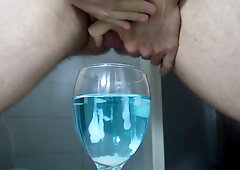 Ejaculating creamy cumshot into a cup of water #2 4