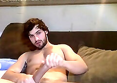 Hot stud jerking his big cock