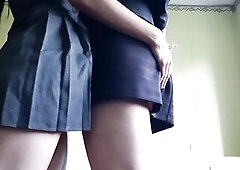 2 female students in short skirts engage in mutual masturbation in a utility room during a break