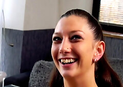 Dark Haired German Beauty With Small Tits Stuffing A Cucumber In Her Muff