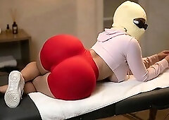 My tiny angel with a gigantic booty is lying face down receiving a unfathomable oily massage on her biggest buns during the time that wearing taut red