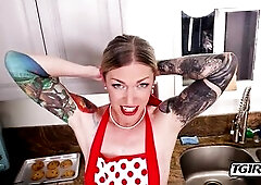 Racy Tracy is serving up smth enchanting in the kitchen - but cookies are just the appetizer. This babe looks gutsy in her polka-dot apron, baking a n