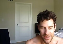 Friendly boy chats while sticking things in his ass