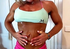 Oiled abs, bicep flex, big tits flash