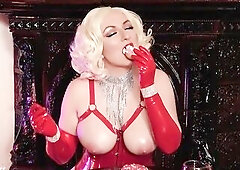 hot pin up hotty eating donuts in latex gloves