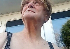 Betty Spanxxx shows off in a short dress during her outdoor solo adventure