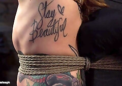 Tattooed bound slave mounted on sybian