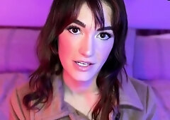 A brown haired girl in dark-hued with teasing