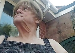 Betty Spanxxx shows off in a short dress during her outdoor solo adventure