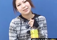 Voyeur films a Japanese hottie who is pissing in her underwear while her friend watches, decked out in lingerie and boots.