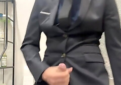 Jacking off with suit on