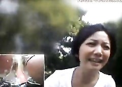 Oriental Hotty Rides around city on a bicycle with a sex toy attached!