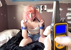 Transgender girl in bondage struggles while gagged and shocked with a collar