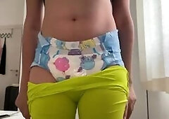 Cute girl wets her diaper