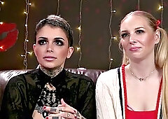 Tattooed lesbian babe pegging electrosex sub