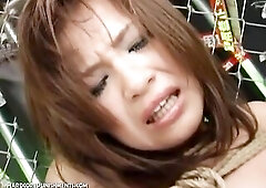 Suspended from above,, Marina is subjected to pussy and tit torture until she cums repeated and squirts all over the place.